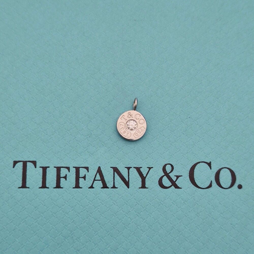 RARE Tiffany & Co. 1837 Circle Mini Pendant with 0.07 CT Diamond Center